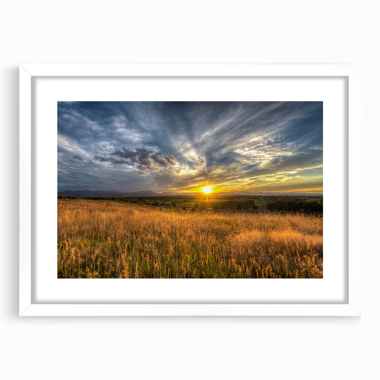Abstract art print of Boulder, Colorado in muted earth tones on a white framed canvas.