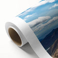 Art deco poster of Pikes Peak in muted blue and green tones on rolled canvas, ideal for nursery wall art.