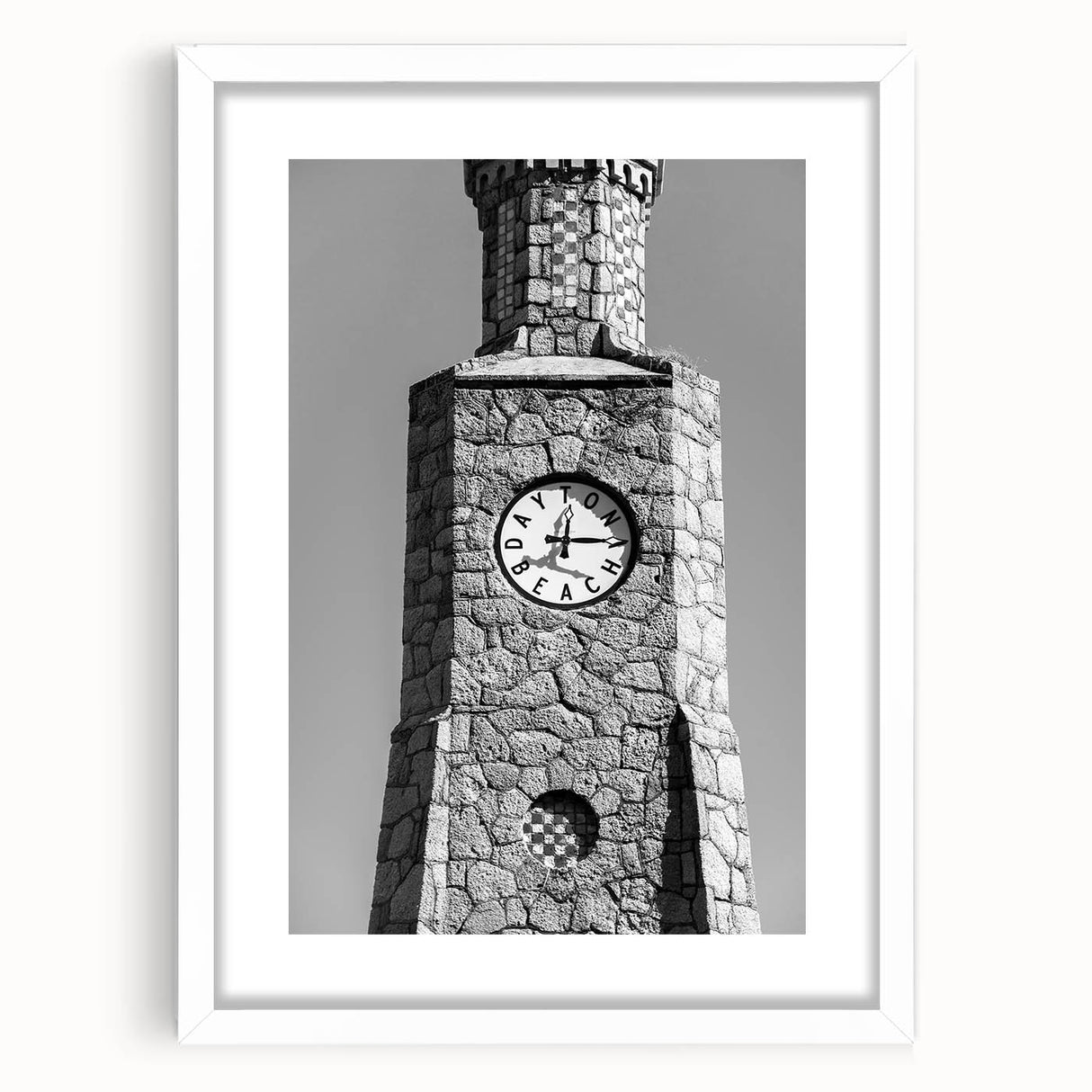 Abstract art print of Daytona scenery in muted blue and green tones on a white framed poster, suitable for dining room decor.