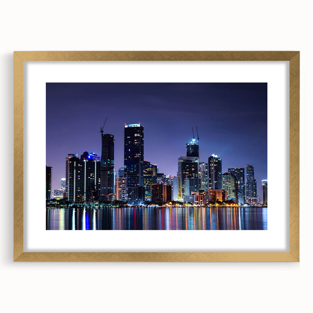 Extra large abstract art print of Miami skyline in textured gold frame, ideal for living room decor.