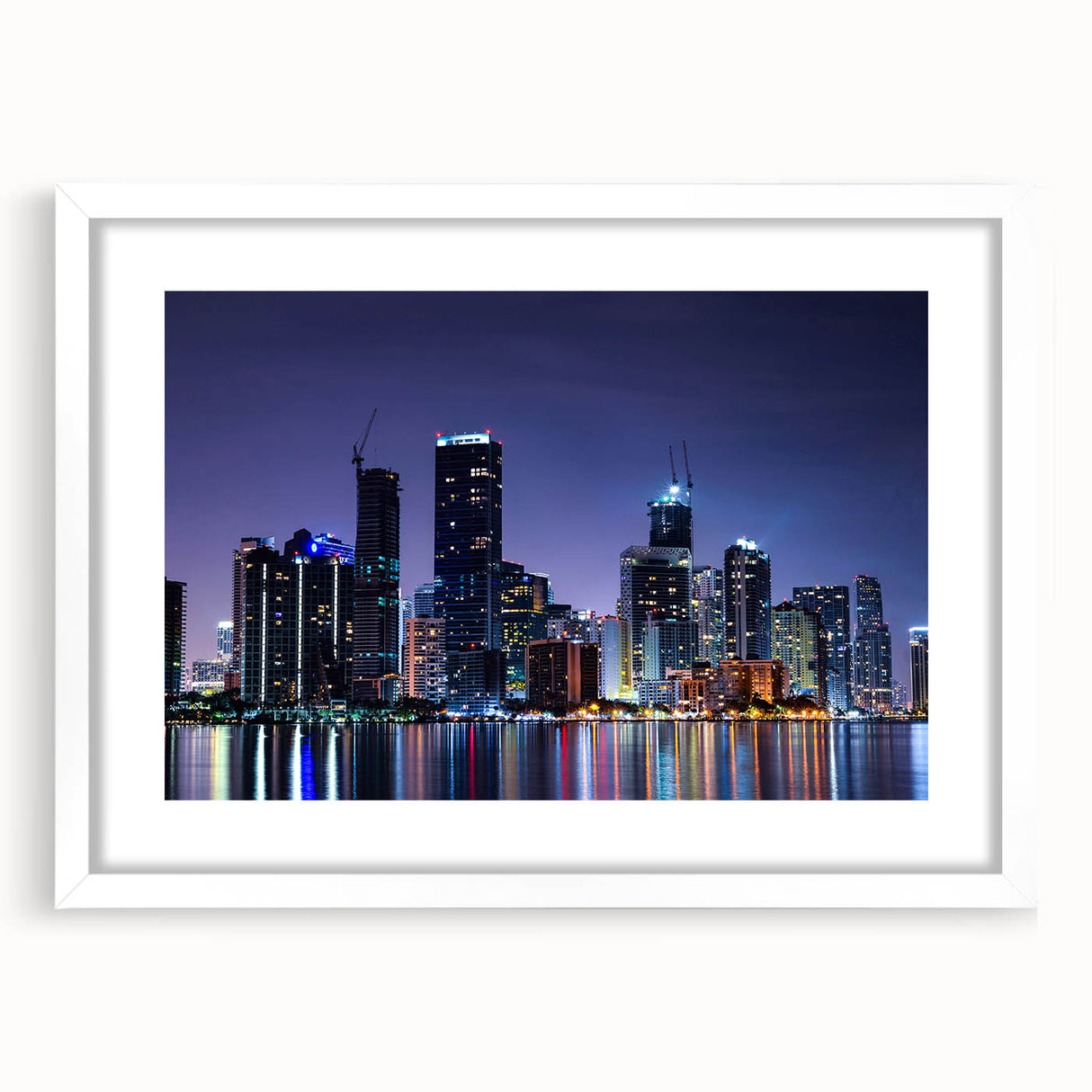 Abstract art print of Miami skyline in pastel shades on a white framed mat, suitable for bedroom or dining room decor.