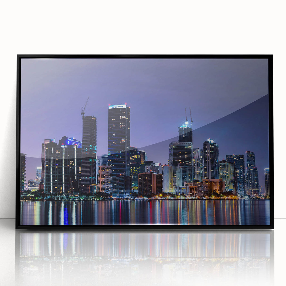 Large abstract wall art featuring vibrant Miami skyline in acrylic, framed in black, ideal for modern living room decor.