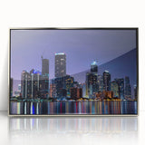 Mid-century modernist art depicting Miami skyline in pastel shades on a silver-framed acrylic print.