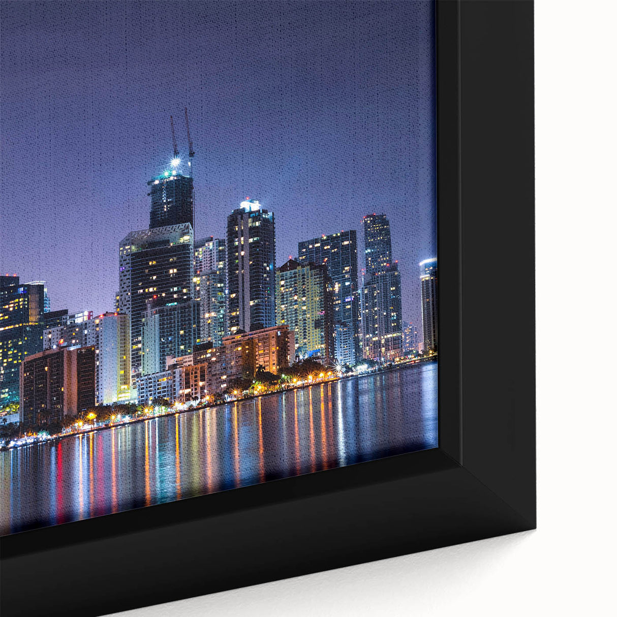 Framed canvas of a textured Miami skyline in black with vibrant colorful accents, ideal for living room decor.
