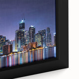 Framed canvas of a textured Miami skyline in black with vibrant colorful accents, ideal for living room decor.
