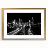 Extra large wall art featuring an abstract Atlanta skyline in textured hues of gold and blue on a framed canvas.