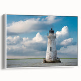 Vintage poster art of Savannah, Georgia on a framed canvas, featuring colorful artwork against a black background.