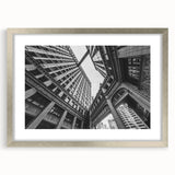 Textured art print of abstract Chicago skyline in muted silver and gray tones on a framed mat, ideal for bedroom decor.