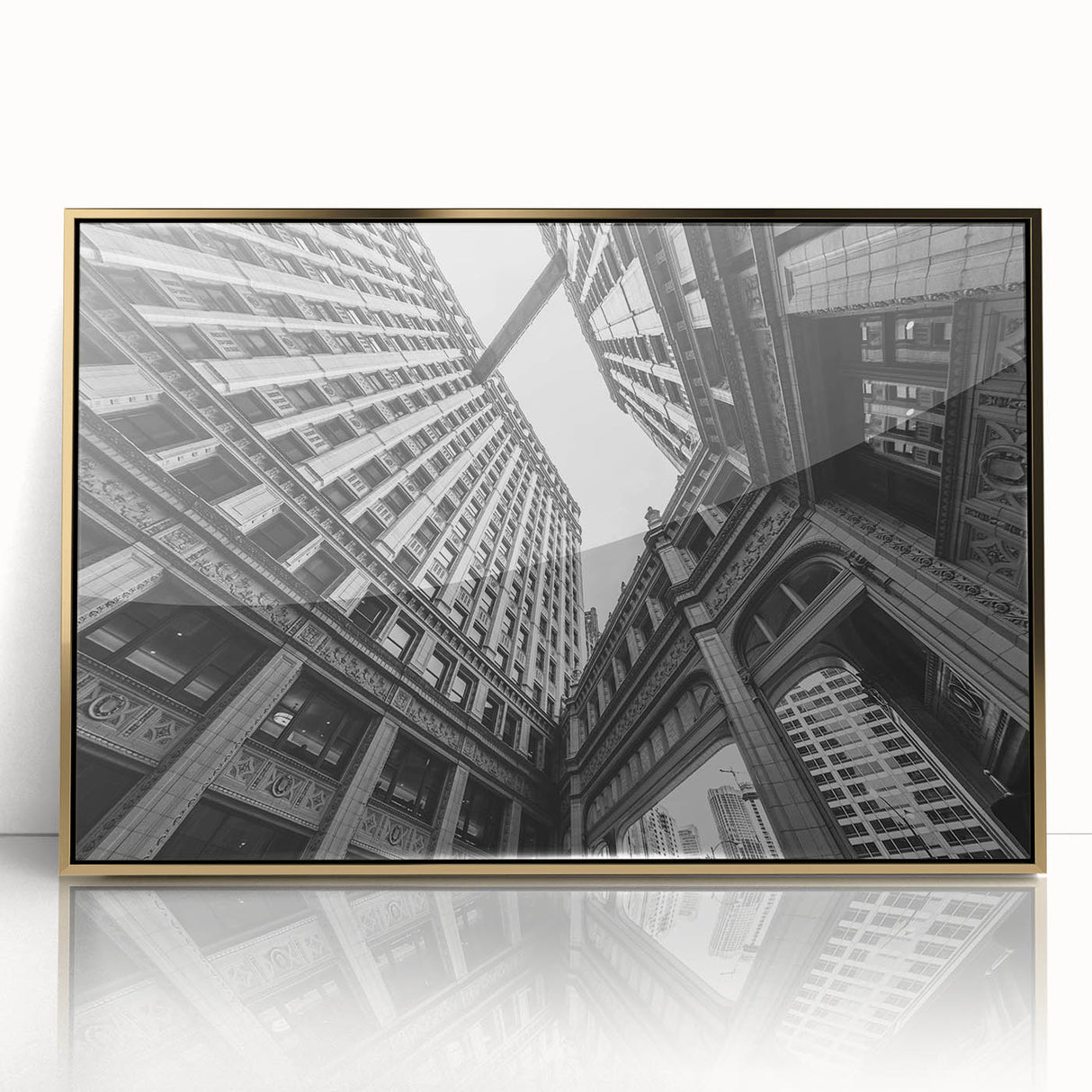 Large art print of Chicago skyline in muted gold tones on acrylic, framed, in a mid-century modernist style.