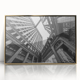 Large art print of Chicago skyline in muted gold tones on acrylic, framed, in a mid-century modernist style.