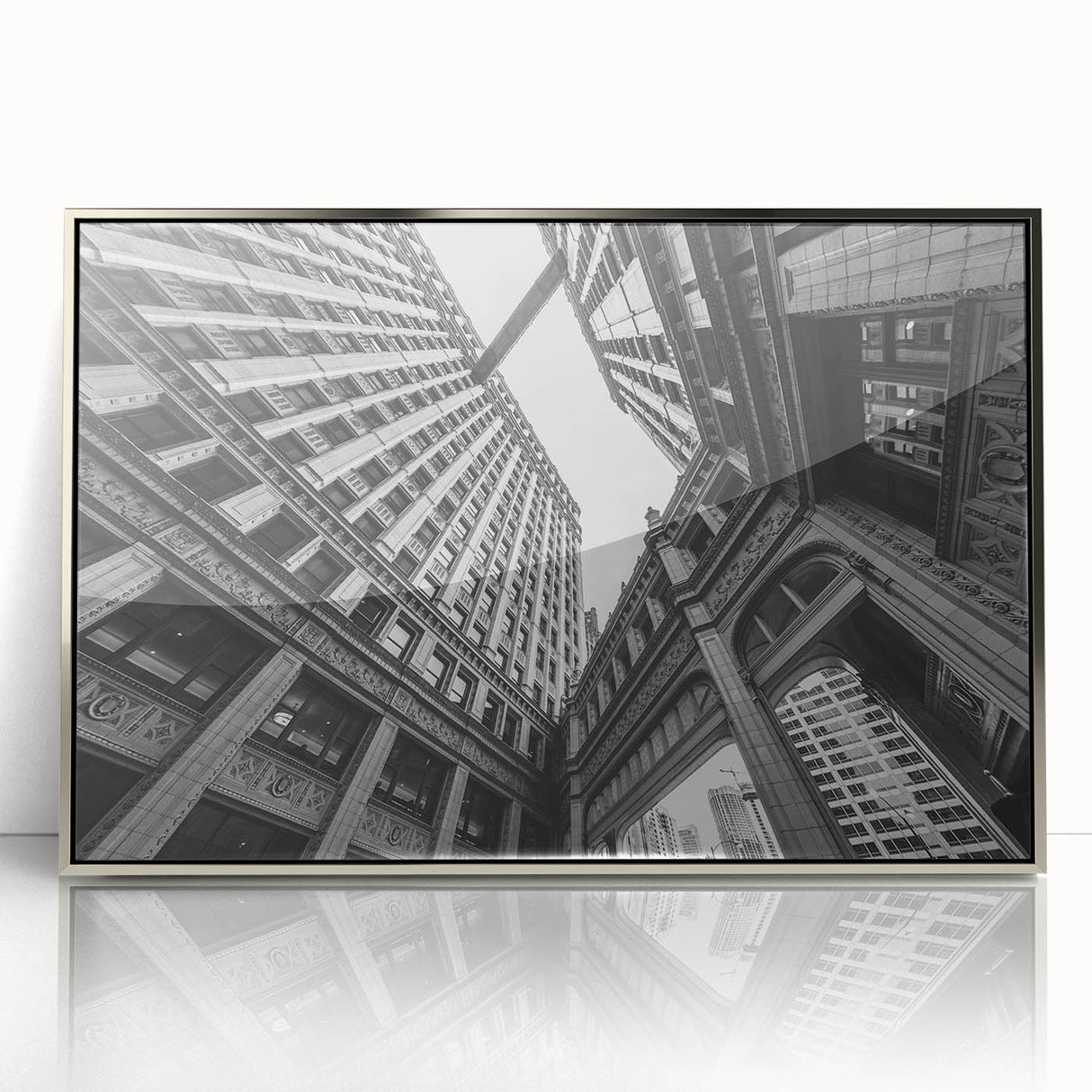 Mid-century modernist art of Chicago skyline in silver framed acrylic, suited for modern art wall decor.