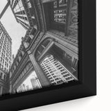 Framed canvas of Chicago skyline in textured black with colorful accents, ideal for living room decor.