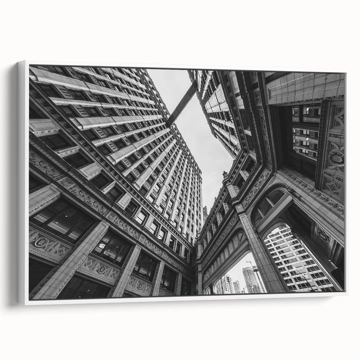 Vintage poster art of Chicago skyline in colorful hues on a framed canvas, ideal for living room decor.