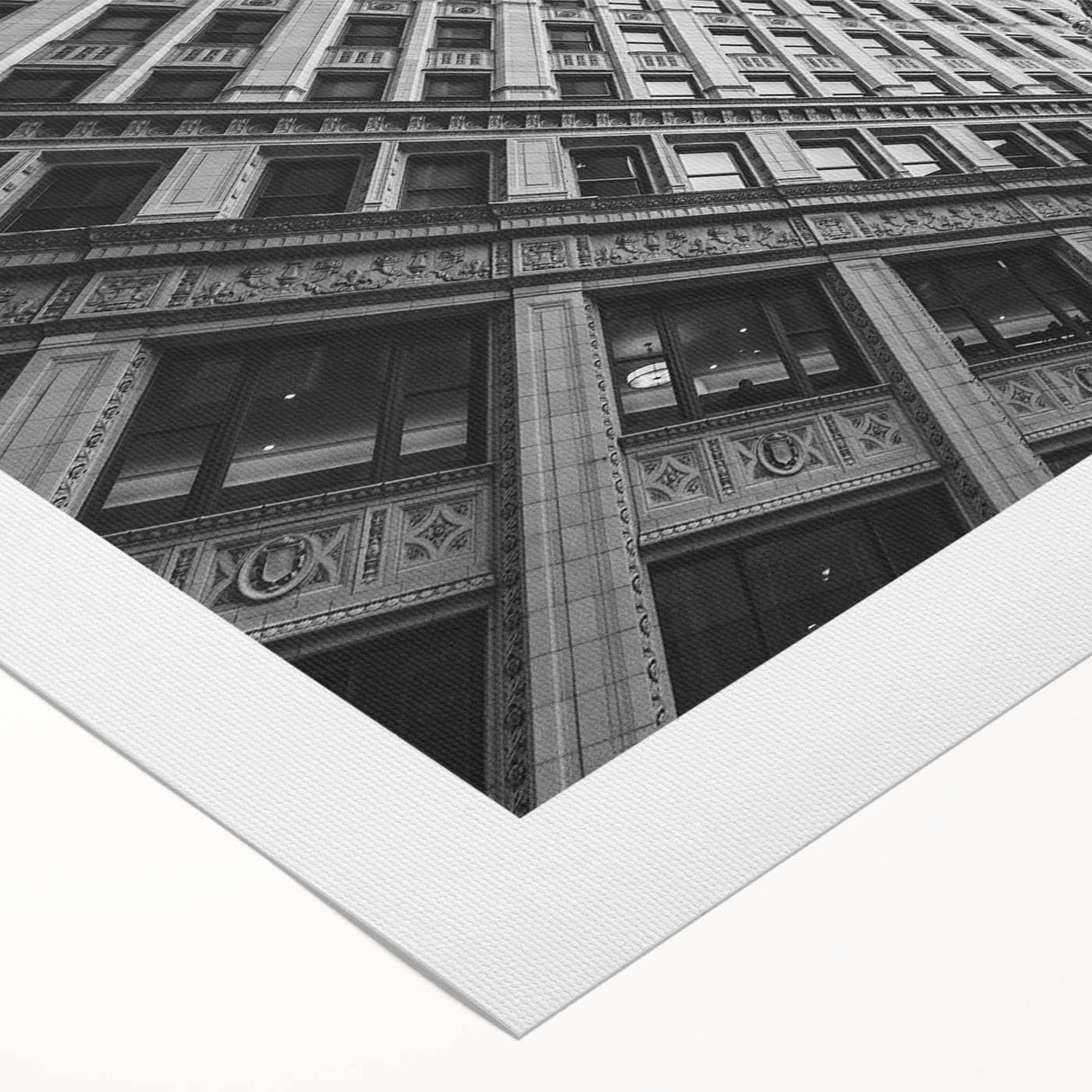 Art deco poster of Chicago skyline in monochrome shades on rolled canvas, suitable for dining room wall.