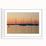 Abstract art print of Annapolis skyline in muted blue and white tones on a framed poster, suitable for dining room decor.