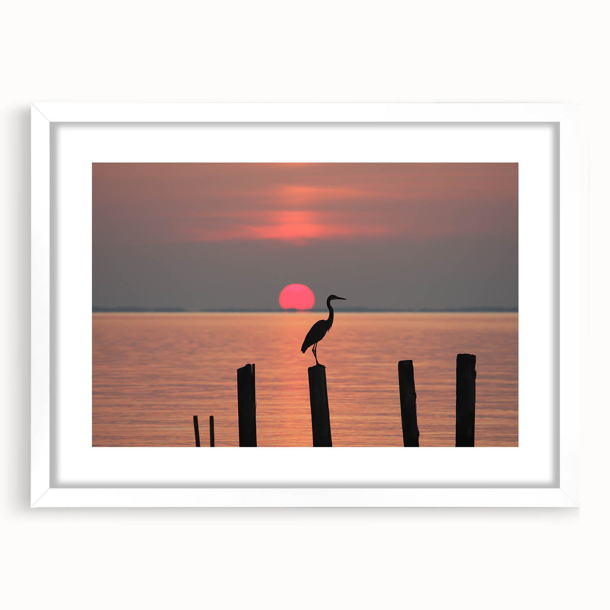 Abstract art print of Chesapeake Bay in muted blue and green tones on a framed white mat, ideal for dining room decor.