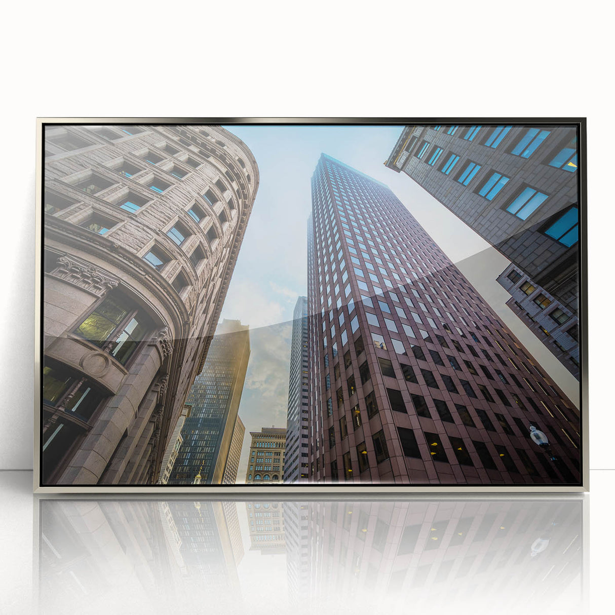 Mid-century modernist art depicting the Boston skyline in muted blue tones on a framed acrylic print.