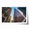 Rolled print of Boston skyline in muted blue tones, suitable for dining room wall art.