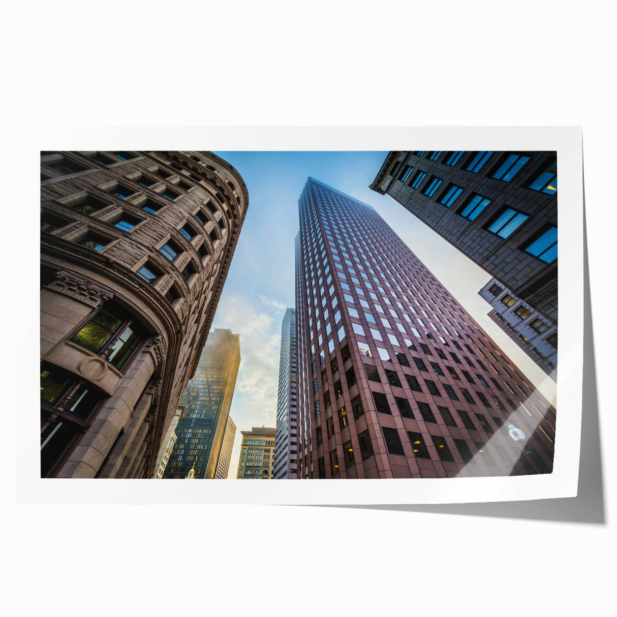 Rolled print of Boston skyline in muted blue tones, suitable for dining room wall art.