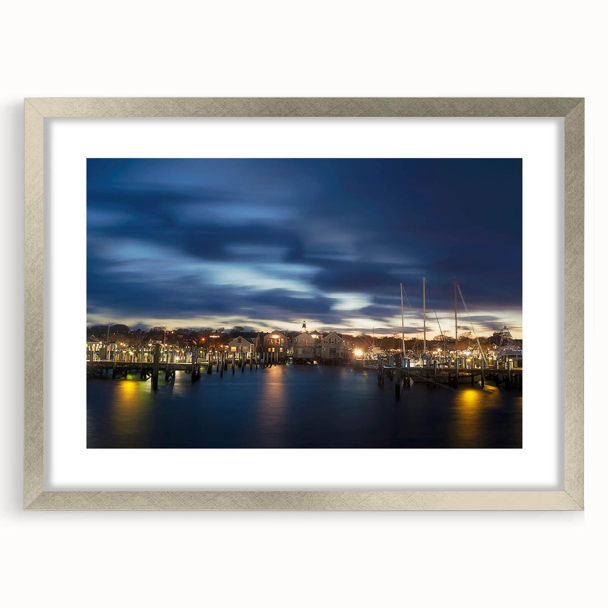 Textured abstract art print of a Massachusetts, Nantucket scenery in muted blue and gray, framed in silver.