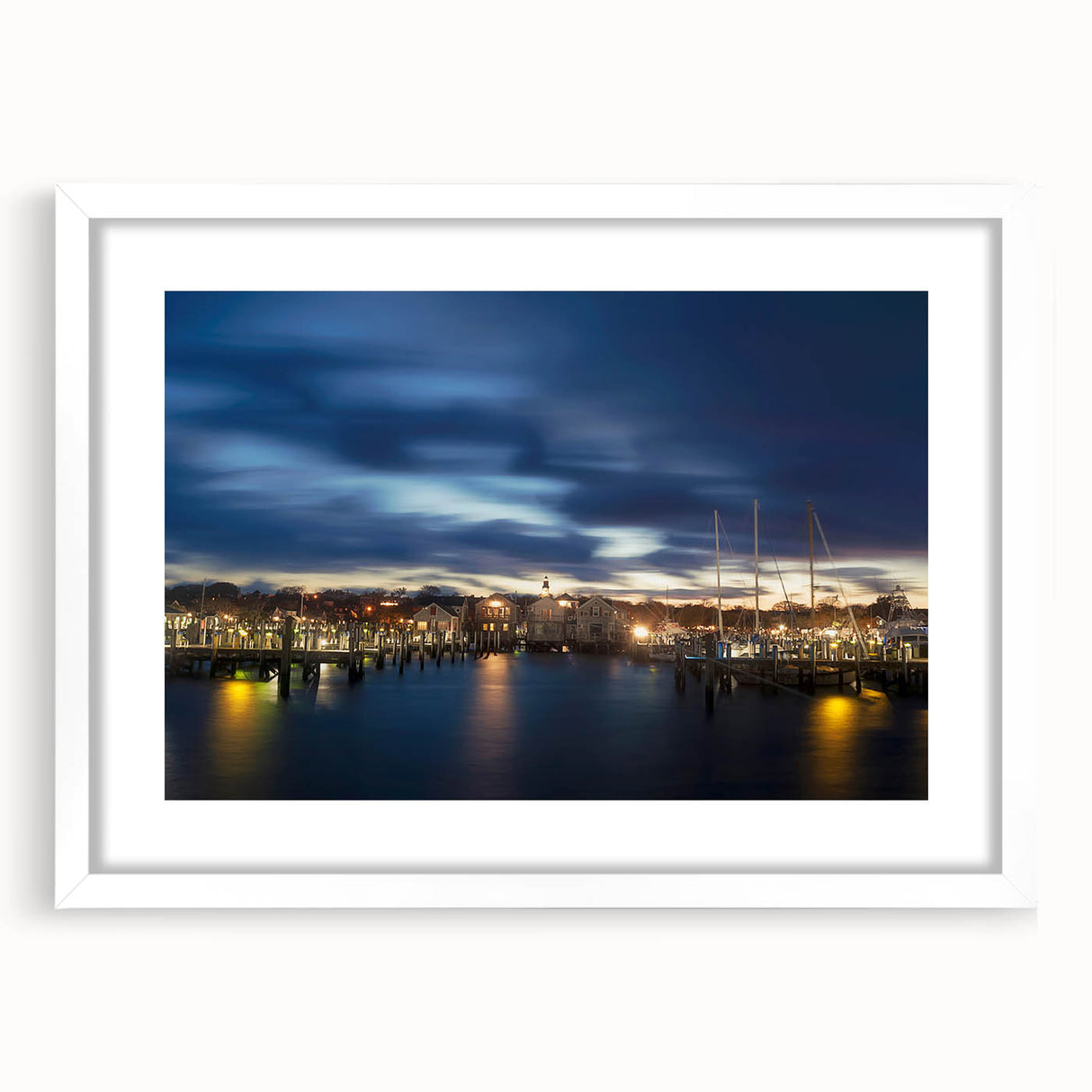 Abstract art print of Nantucket landscape in muted blue and white tones, framed with a white mat.