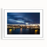 Abstract art print of Nantucket landscape in muted blue and white tones, framed with a white mat.
