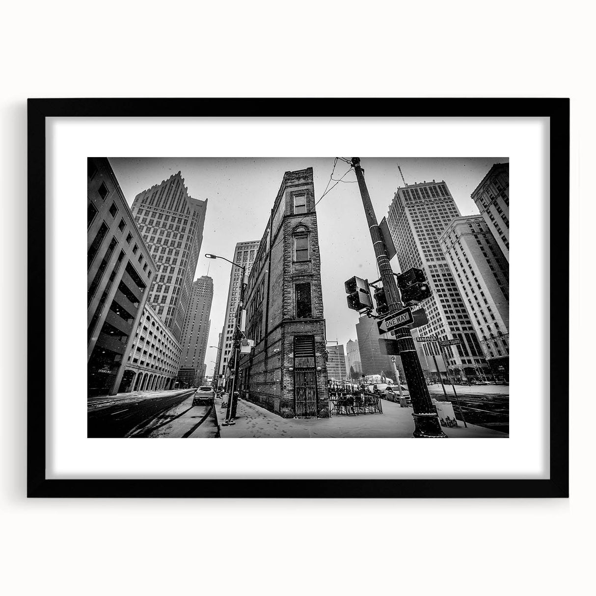Extra large abstract art print of a colorful Detroit skyline in vibrant hues on a textured canvas, framed in black.