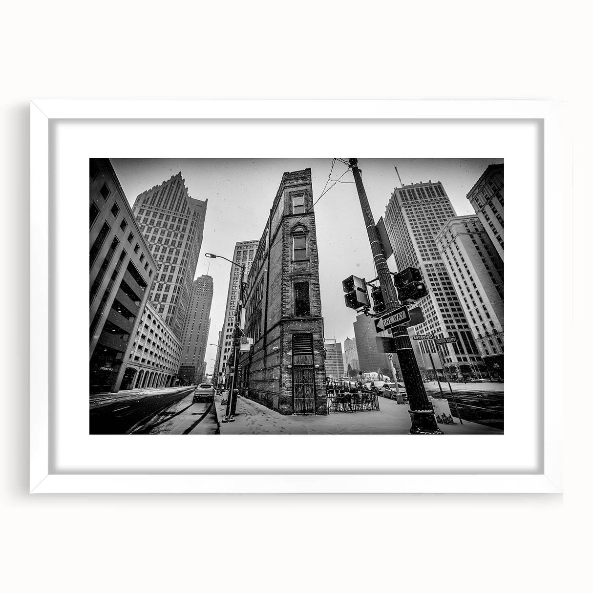 Abstract art print of Detroit skyline in muted gray and blue tones on a framed white mat, ideal for dining room decor.
