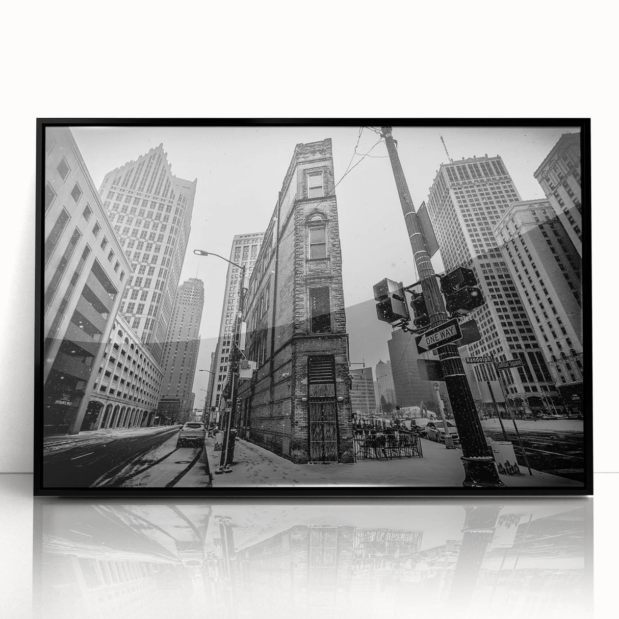 Large abstract wall art depicting Detroit skyline in muted gray and blue tones on framed acrylic.