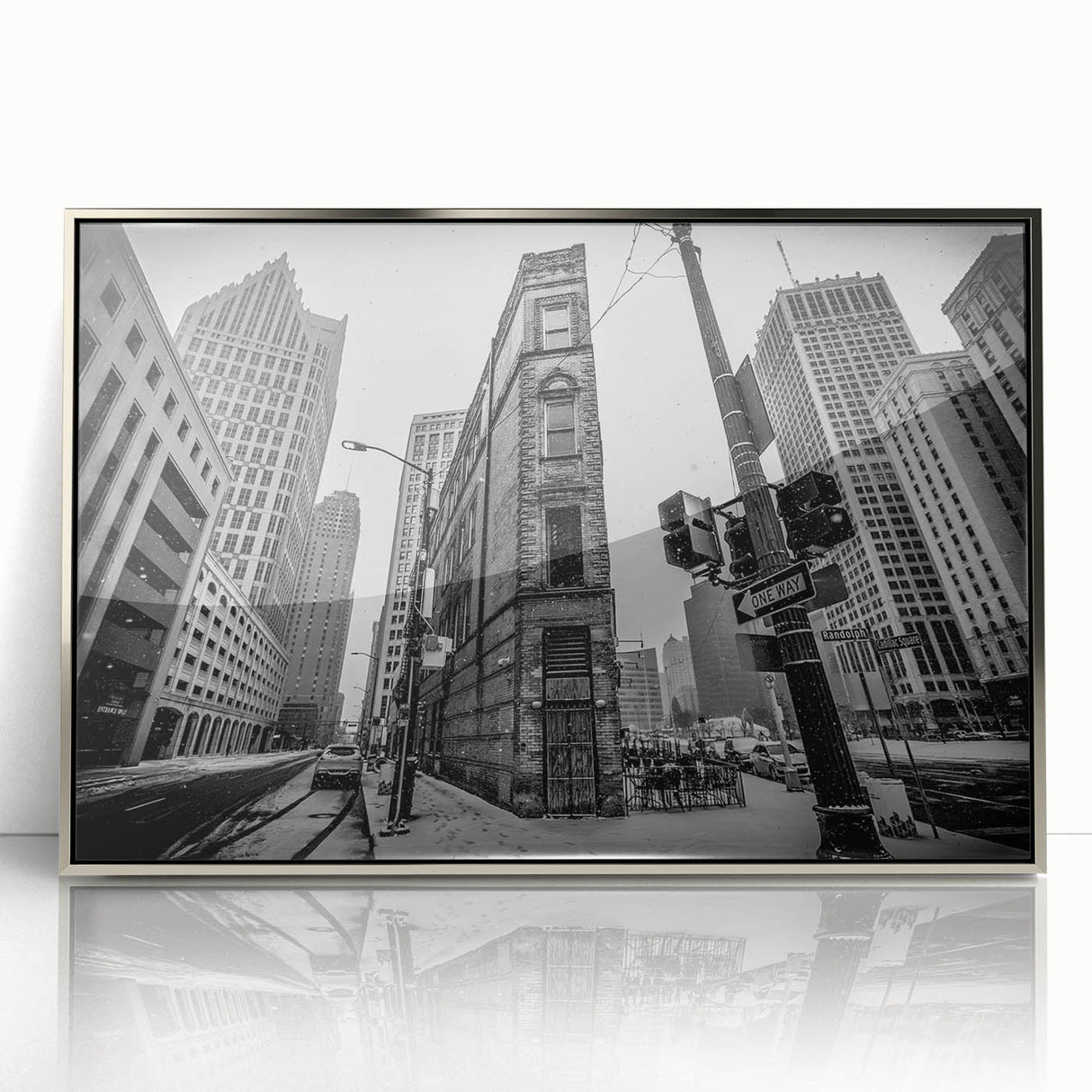 Mid-century modernist art of Detroit skyline in muted gray and blue tones on a framed acrylic print.