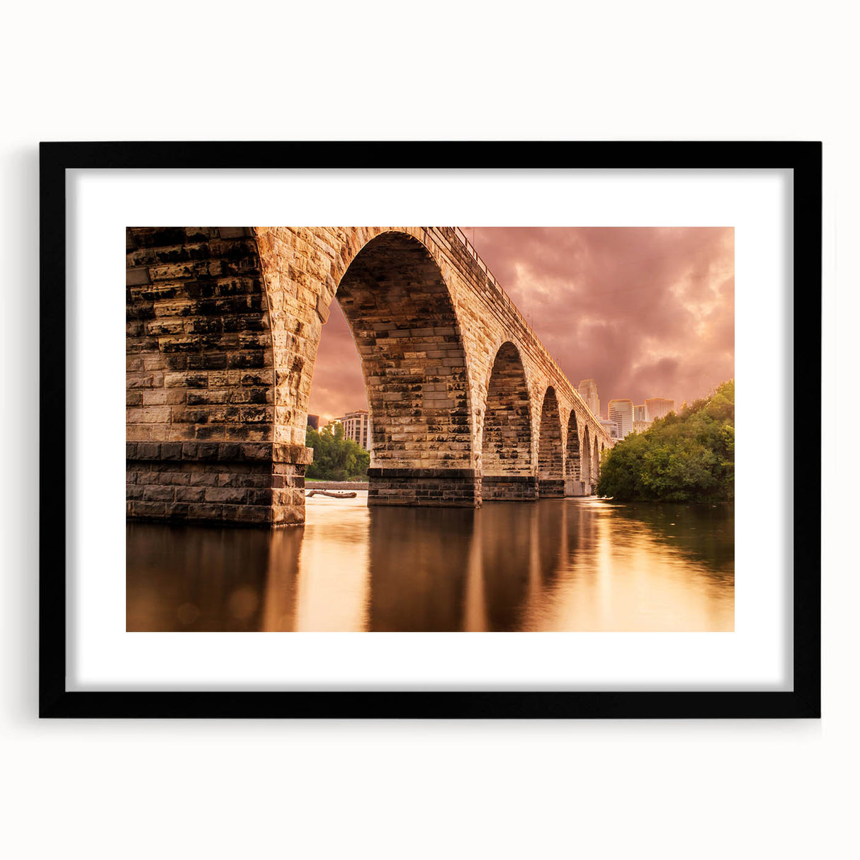 Abstract art print of Minneapolis skyline with textured, colorful strokes on a large black-framed canvas.