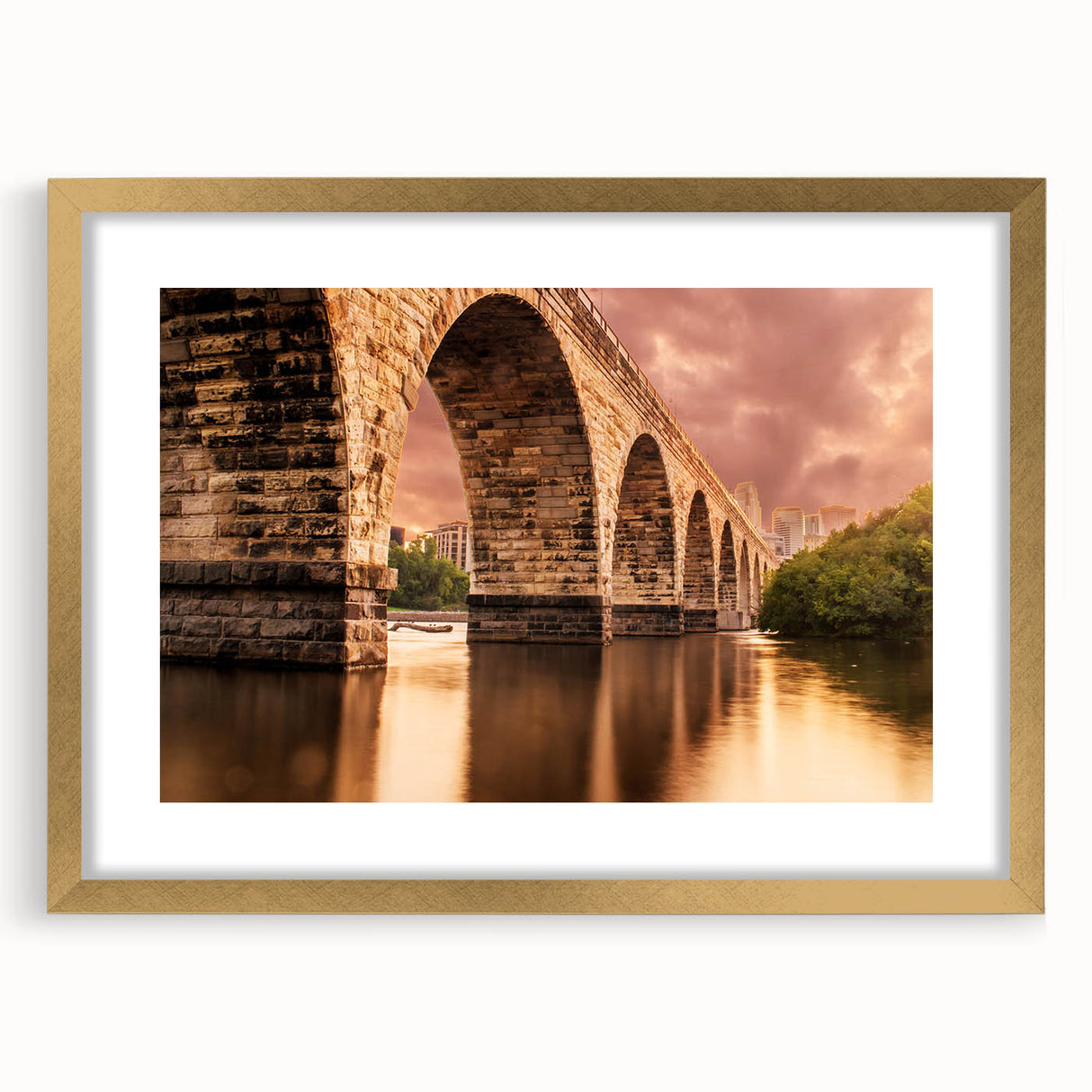 Extra large abstract art print of Minneapolis skyline in gold frame, featuring textured elements in muted colors.