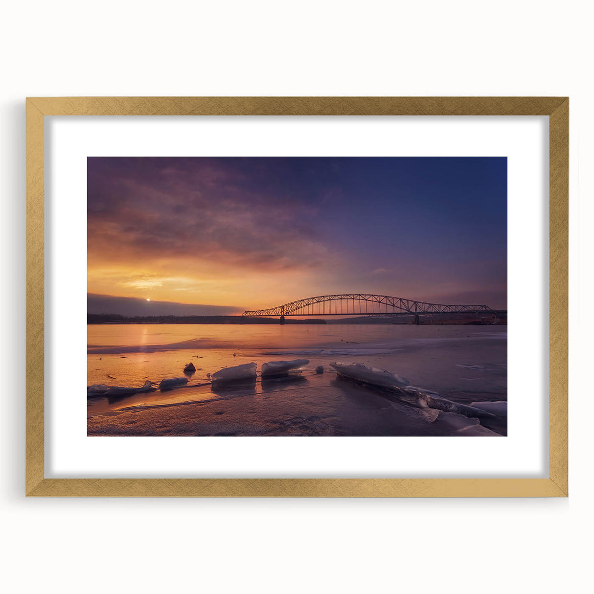 Extra large abstract art print depicting a textured Mississippi scenery in muted earth tones, framed in gold.