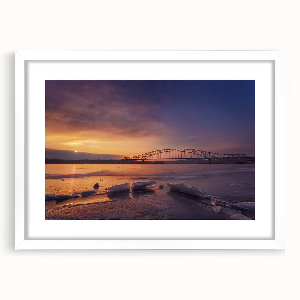 Abstract art print of a Mississippi landscape in muted green and blue tones, framed with a white mat.