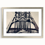 Abstract art print of the St. Louis skyline in muted gray and blue tones, framed in silver, ideal for dining room decor.