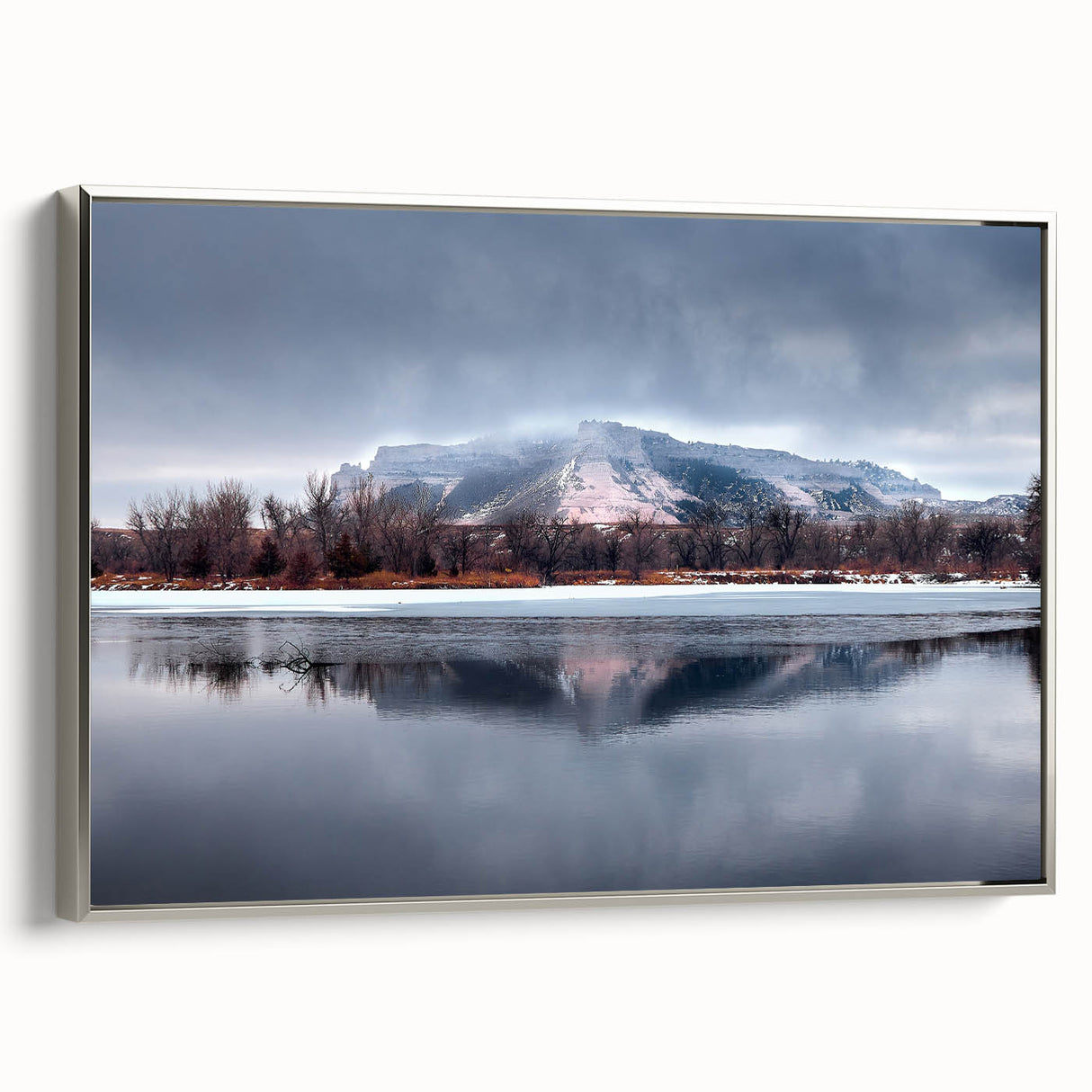 Framed canvas of a Nebraska landscape painting in muted earth tones, ideal for living room decor.