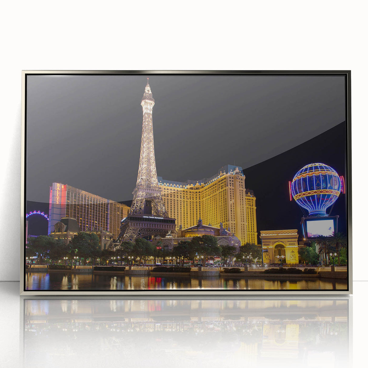 Mid-century modernist Las Vegas skyline in muted metallic tones on a framed acrylic print.