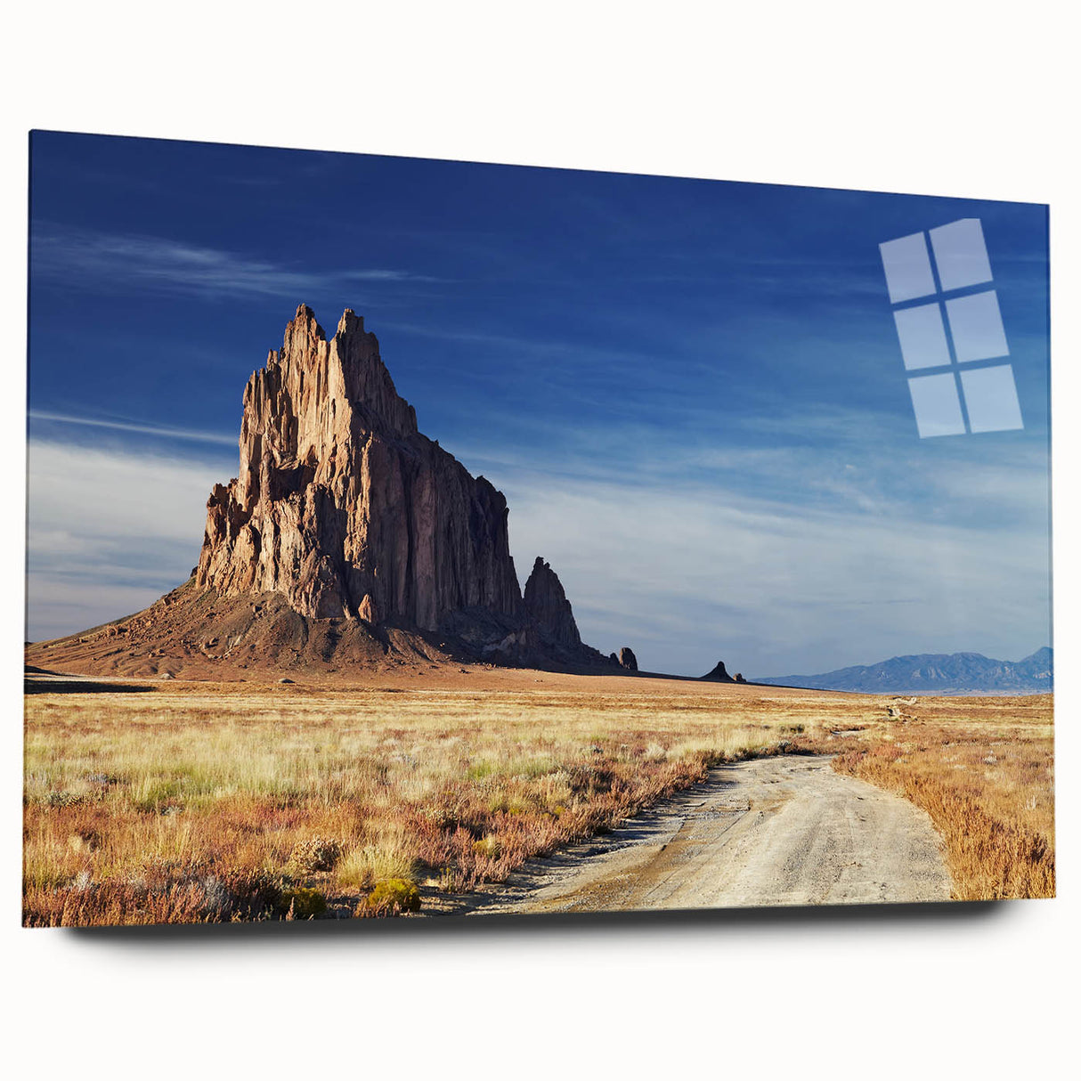 Large abstract wall art of New Mexico scenery in muted earth tones on acrylic glass, ideal for bedroom or dining room decor.