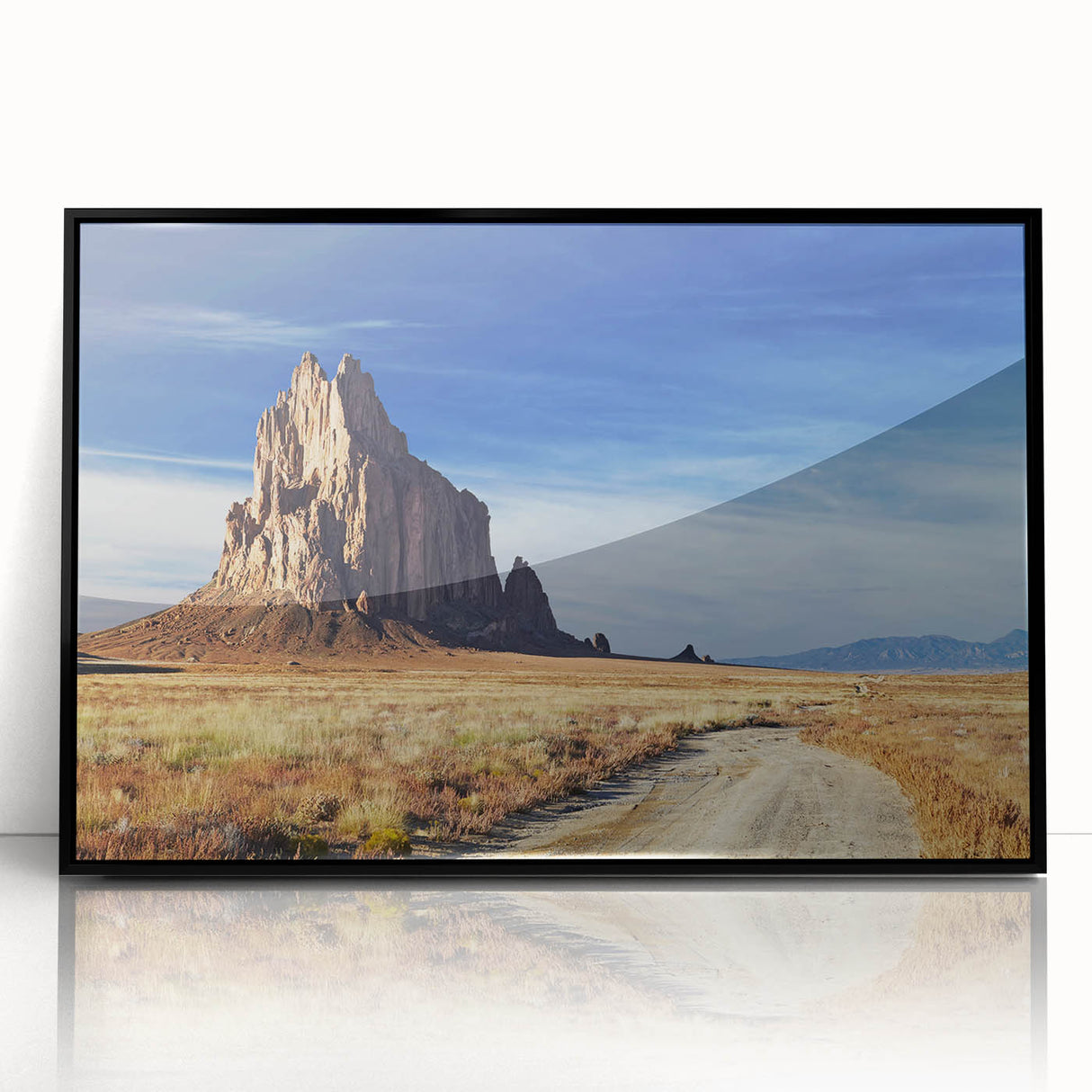Large abstract wall art depicting a New Mexico landscape in muted earth tones, framed in black acrylic.