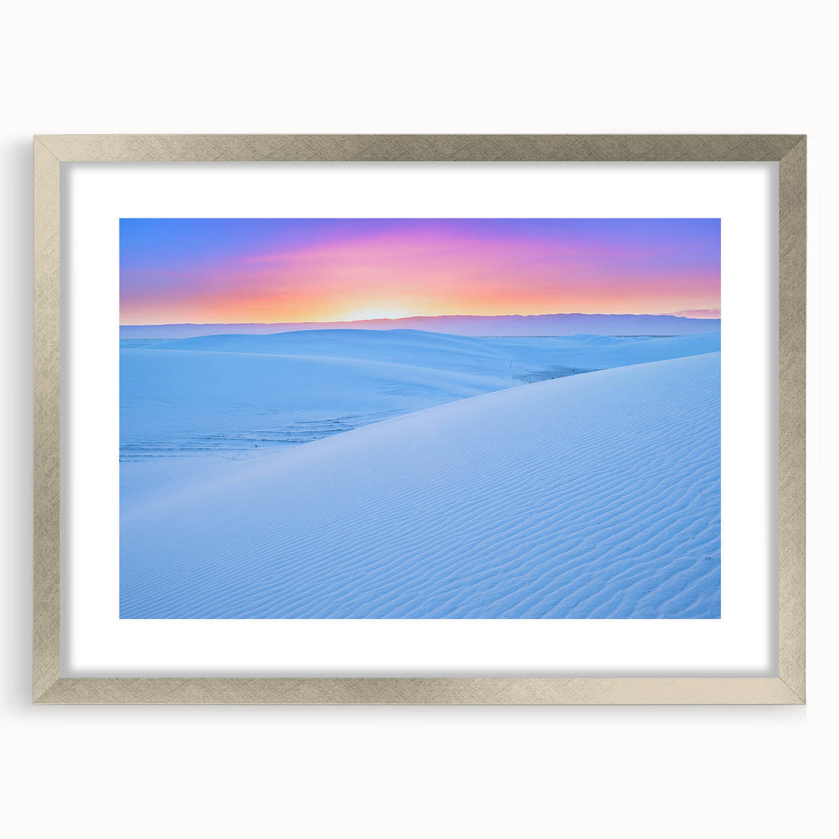Textured art of abstract white sands in New Mexico, in muted tones on a silver-framed mat, suitable for bedroom decor.