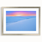 Textured art of abstract white sands in New Mexico, in muted tones on a silver-framed mat, suitable for bedroom decor.