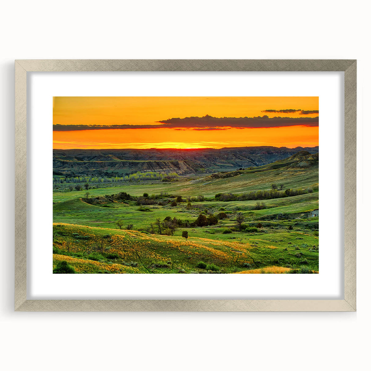 Textured art depicting abstract North Dakota scenery in muted earth tones on a framed silver mat, suitable for bedroom decor.