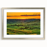 Textured art depicting abstract North Dakota scenery in muted earth tones on a framed silver mat, suitable for bedroom decor.