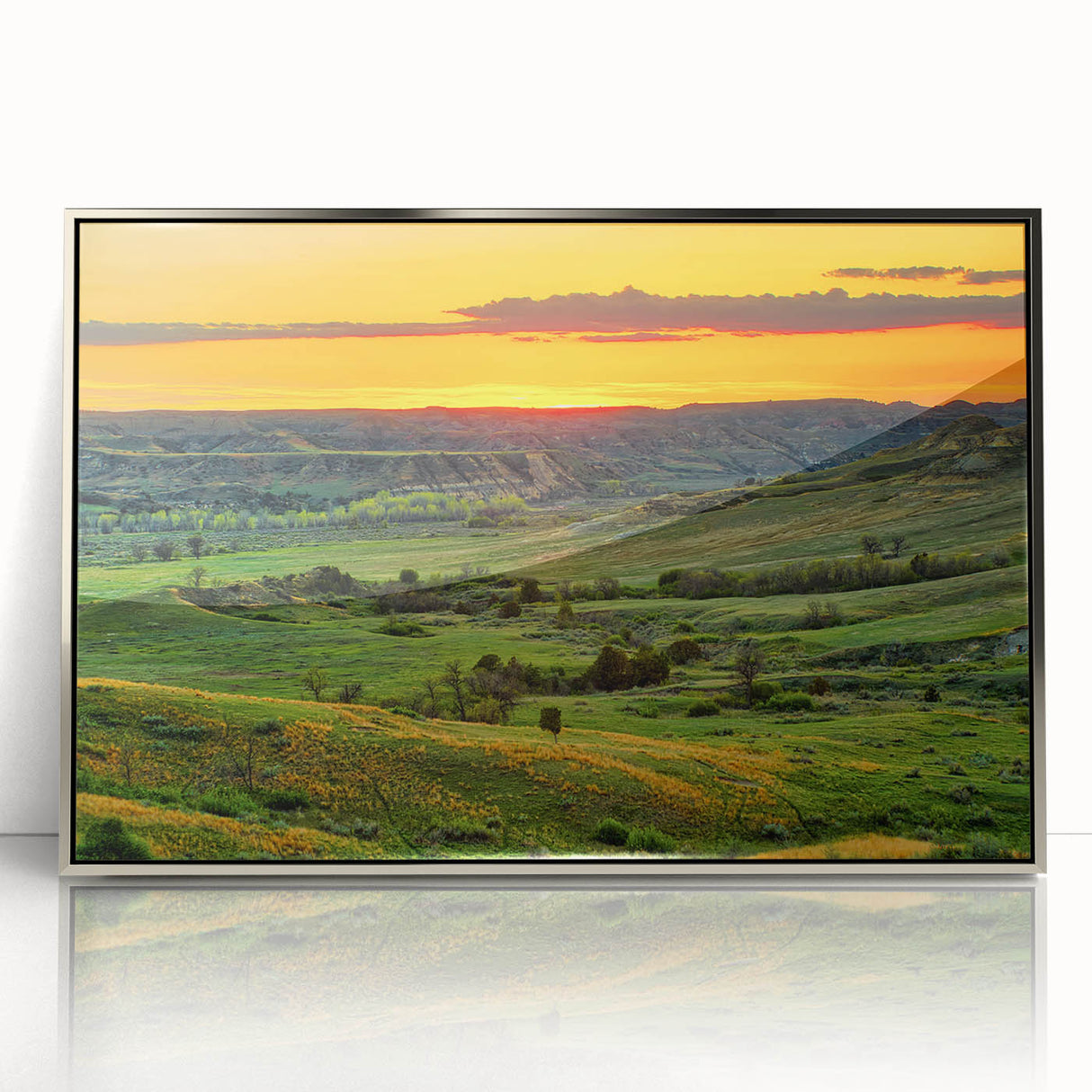 Mid-century modernist art depicting North Dakota scenery in muted earth tones on a silver-framed acrylic print.