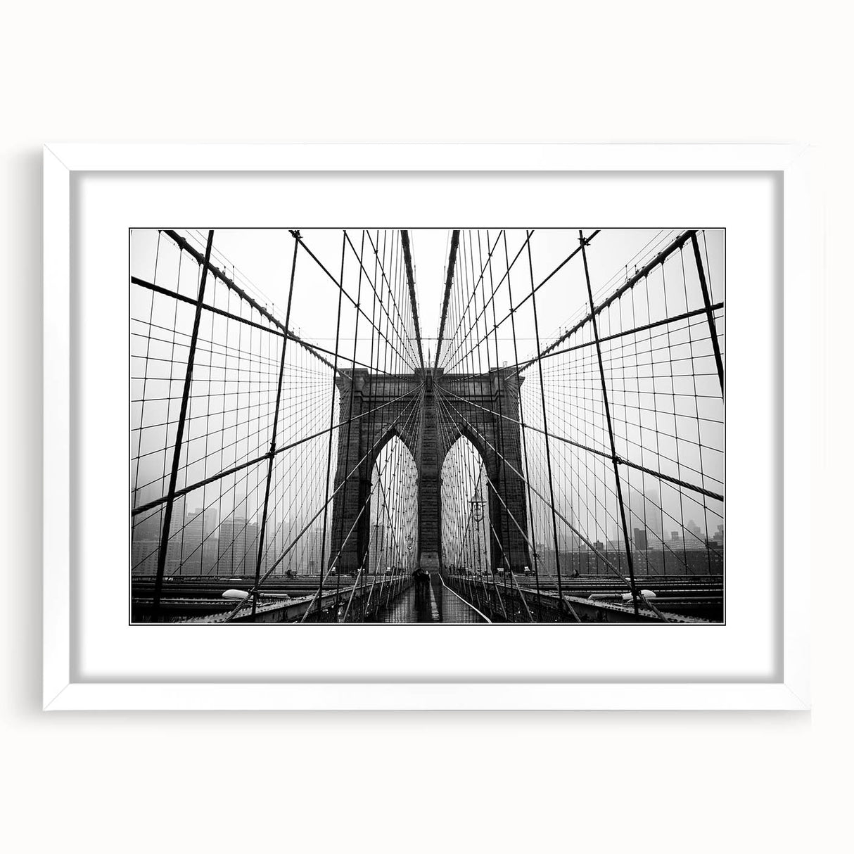 Abstract art print of the Brooklyn Bridge in muted gray tones on a framed white mat, ideal for bedroom or dining room decor.