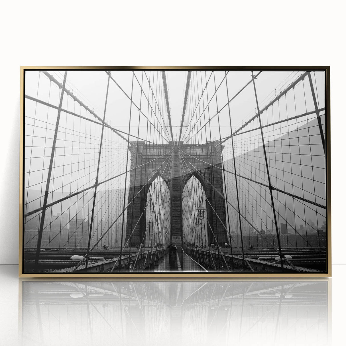 Acrylic print of the Brooklyn Bridge in muted gray tones, framed in gold, ideal for modern art wall decor.