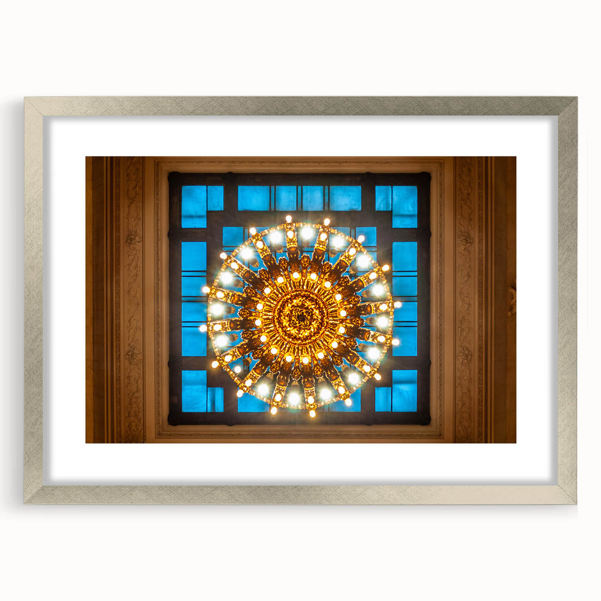 Textured abstract art print of the Grand Central Station in muted gray tones, framed in silver, ideal for bedroom art.