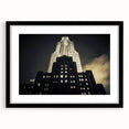 Abstract art print of NYC skyline in vibrant colors on a large textured canvas, ideal for living room decor.