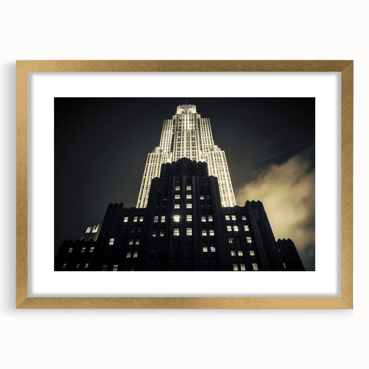 Extra large abstract art print of New York City, featuring textured strokes in cool gray tones on a gold-framed canvas.