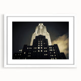 Abstract art print of New York City skyline in muted gray and blue tones on a framed white mat, ideal for dining room decor.